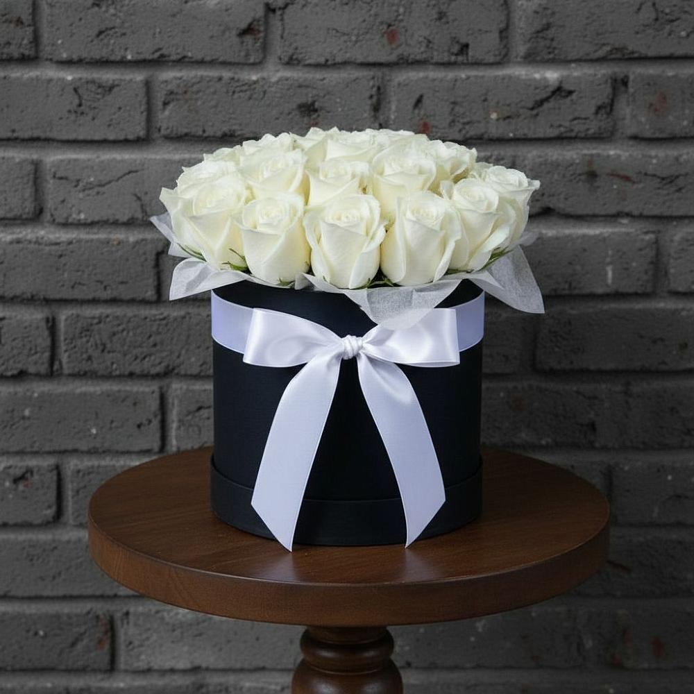 Цветочная композиция из Розы в шляпной коробке в Садовый